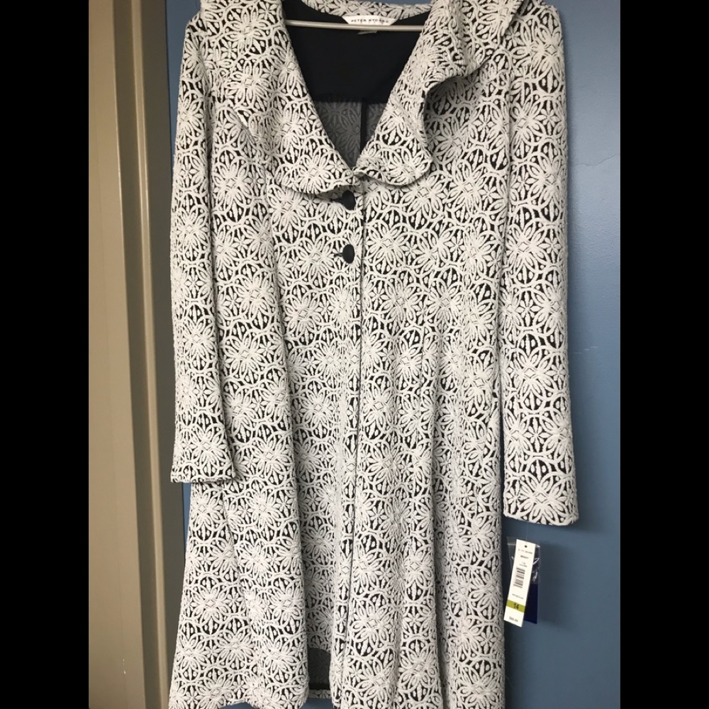 Long partnered Peter Nygard coat